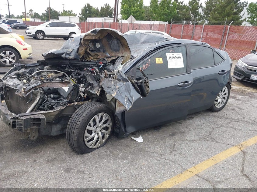 2019 Toyota Corolla VIN 5YFBURHE6KP894435 IAAI salvage auction — ROLLOVER, Salvage (California), sold $25 on 2026-07-21 (photo 2)