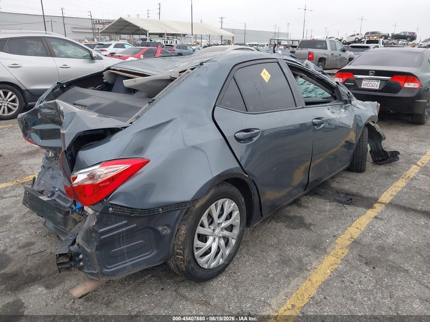 2019 Toyota Corolla VIN 5YFBURHE6KP894435 IAAI salvage auction — ROLLOVER, Salvage (California), sold $25 on 2026-07-21 (photo 4)
