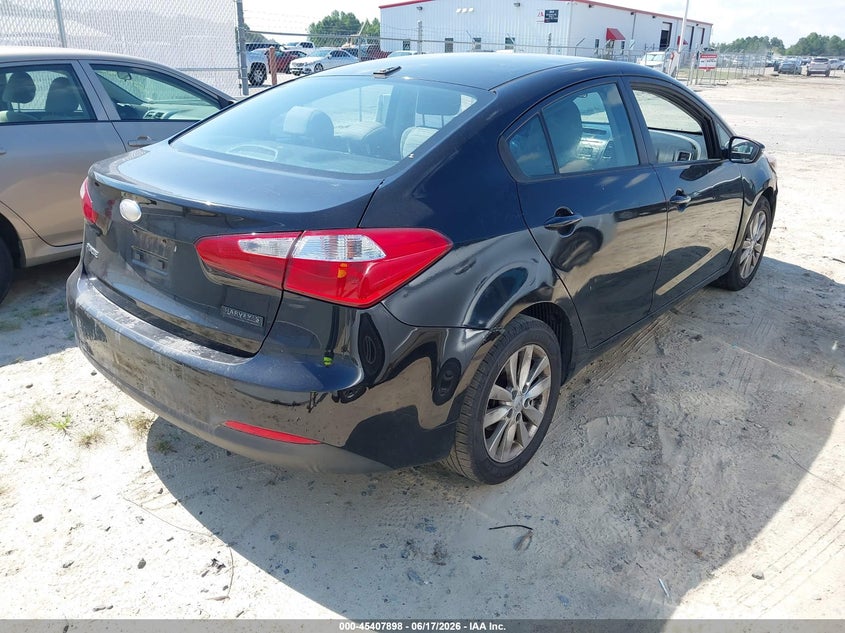 2014 Kia Forte VIN KNAFX4A67E5188667 IAAI salvage auction — NORMAL WEAR, Clear (Virginia), sold $550 on 2026-07-15 (photo 4)