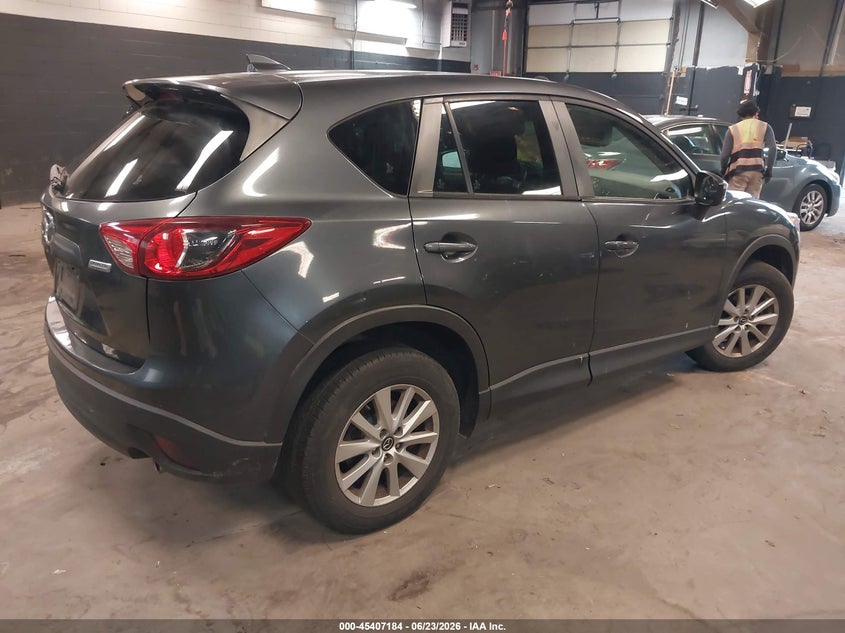 2016 Mazda Cx-5 VIN JM3KE4CY0G0888348 IAAI salvage auction — SIDE, Salvage Title, sold $150 on 2026-07-21 (photo 4)