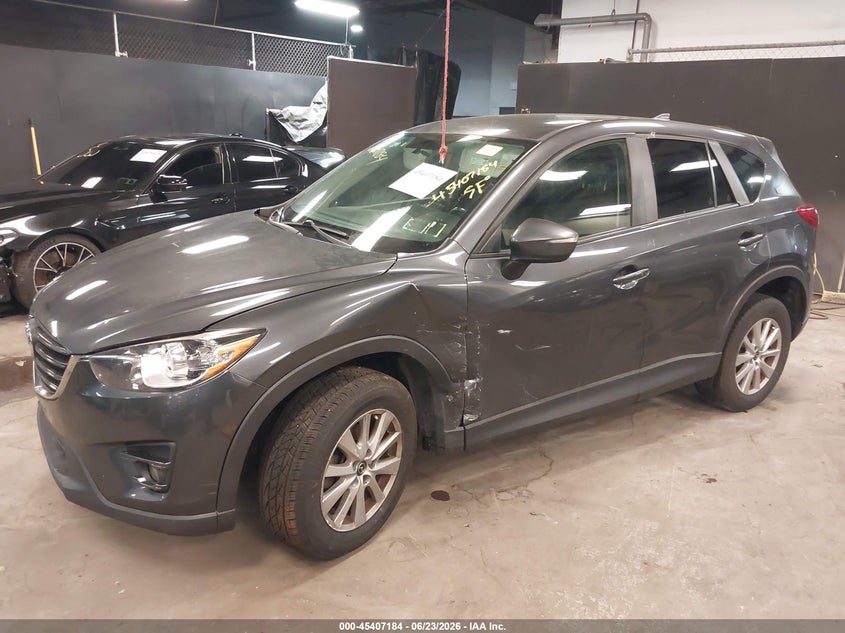 2016 Mazda Cx-5 VIN JM3KE4CY0G0888348 IAAI salvage auction — SIDE, Salvage Title, sold $150 on 2026-07-21 (photo 6)