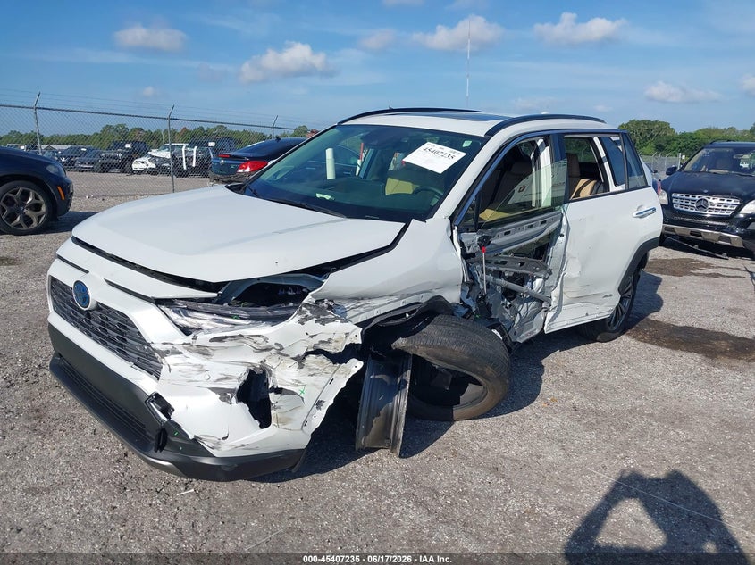 2024 Toyota Rav 4 VIN JTMD6RFV9RJ059885 IAAI salvage auction — LEFT SIDE, Salvage Title, sold $13,050 on 2026-07-30 (photo 2)