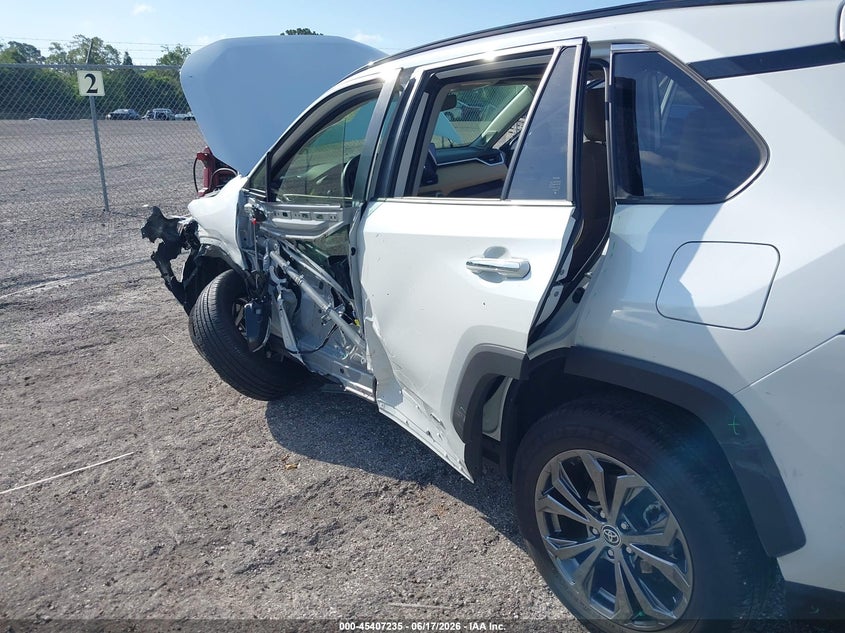 2024 Toyota Rav 4 VIN JTMD6RFV9RJ059885 IAAI salvage auction — LEFT SIDE, Salvage Title, sold $13,050 on 2026-07-30 (photo 6)