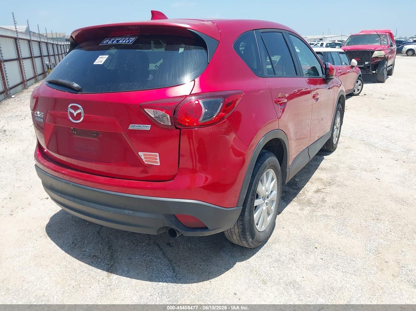 2014 Mazda Cx-5 VIN JM3KE2CY4E0369501 IAAI salvage auction — NORMAL WEAR, Original (Texas), sold $3,575 on 2026-07-14 (photo 4)