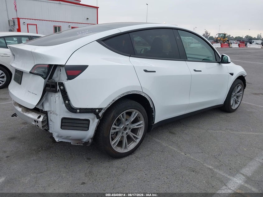 2023 Tesla Model y VIN 7SAYGAEEXPF942015 IAAI salvage auction — REAR END, Salvage (California), sold $12,000 on 2026-07-23 (photo 4)