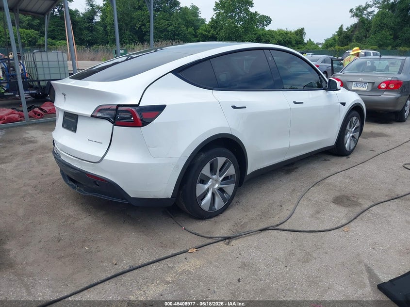 2023 Tesla Model y VIN 7SAYGDEE9PA037697 IAAI salvage auction — FRONT & REAR, Salvage - Greater Than 75% (Maryland), sold $10,600 on 2026-07-30 (photo 4)