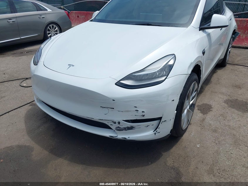 2023 Tesla Model y VIN 7SAYGDEE9PA037697 IAAI salvage auction — FRONT & REAR, Salvage - Greater Than 75% (Maryland), sold $10,600 on 2026-07-30 (photo 6)