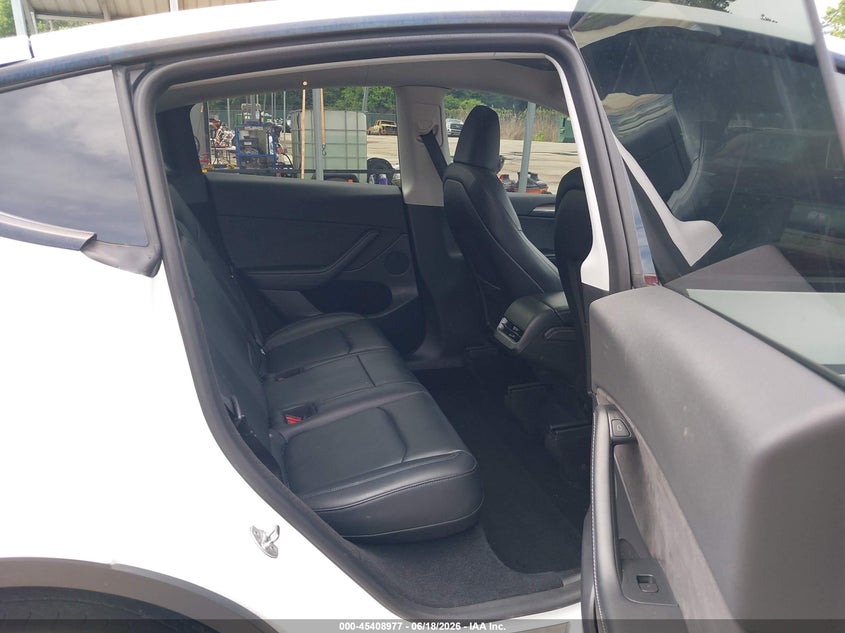 2023 Tesla Model y VIN 7SAYGDEE9PA037697 IAAI salvage auction — FRONT & REAR, Salvage - Greater Than 75% (Maryland), sold $10,600 on 2026-07-30 (photo 8)