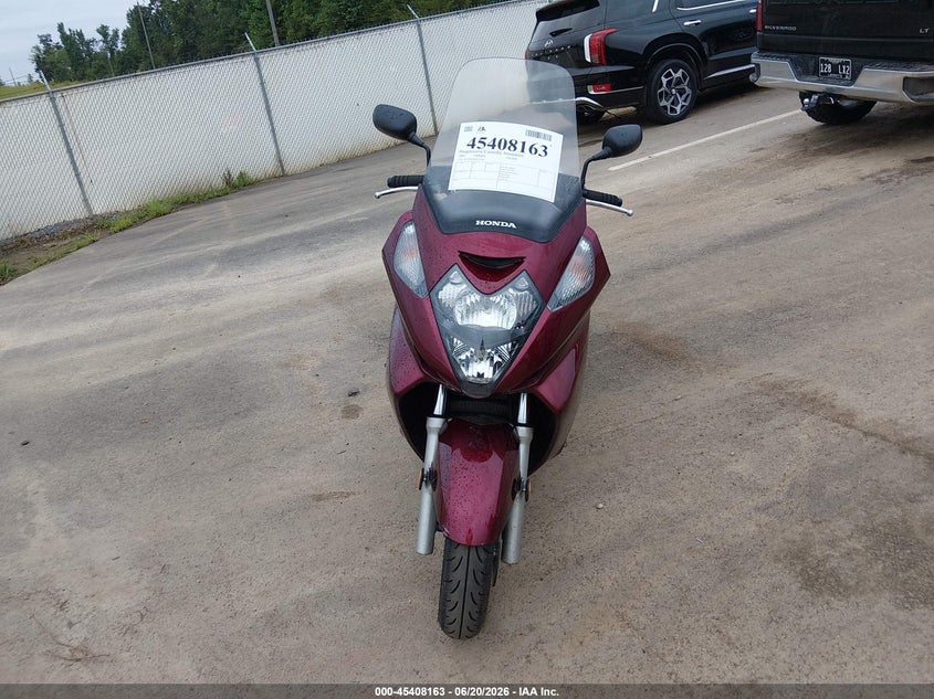 2009 Honda Silver wing VIN JH2PF011X9K700007 IAAI salvage auction — RIGHT SIDE, Salvage (Mississippi), sold $425 on 2026-07-07 (photo 5)