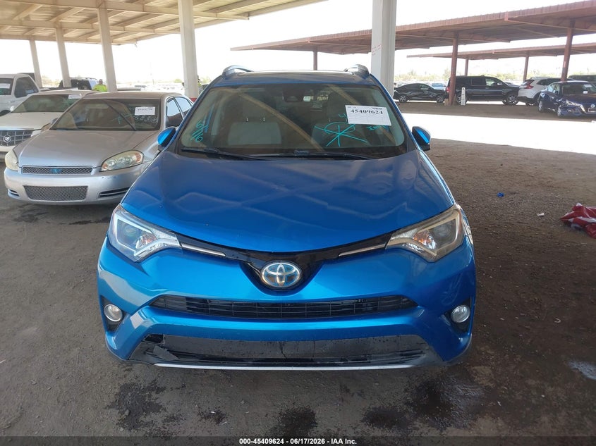 2017 Toyota Rav4 hybrid VIN JTMRJREV6HD076338 IAAI salvage auction — NORMAL WEAR, Clear (Arizona), sold $13,650 on 2026-07-14 (photo 6)