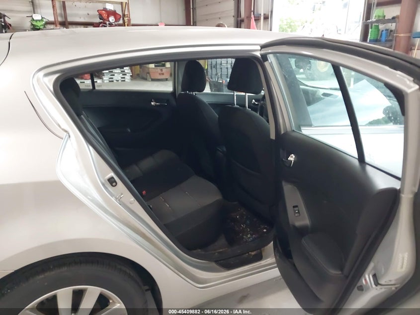 2014 Kia Forte VIN KNAFX5A83E5175700 IAAI salvage auction — NORMAL WEAR, Clear (Michigan), sold $425 on 2026-07-13 (photo 8)
