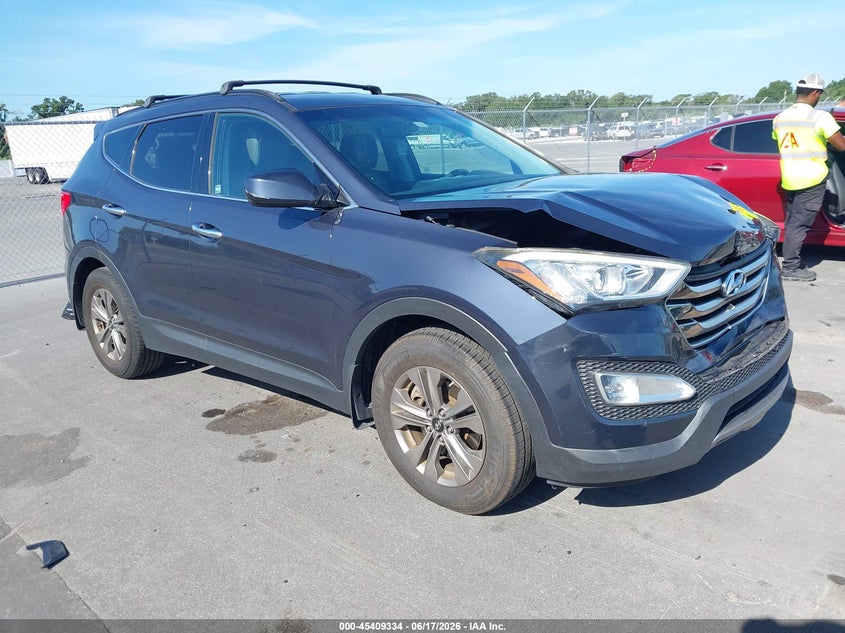 2015 Hyundai Santa fe VIN 5XYZU3LB7FG288063 IAAI salvage auction — FRONT END, Rebuildable (Florida), sold $2,300 on 2026-07-06 (photo 1)