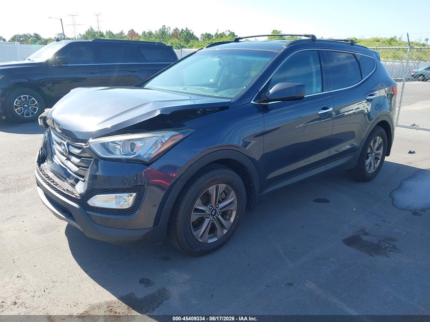2015 Hyundai Santa fe VIN 5XYZU3LB7FG288063 IAAI salvage auction — FRONT END, Rebuildable (Florida), sold $2,300 on 2026-07-06 (photo 2)