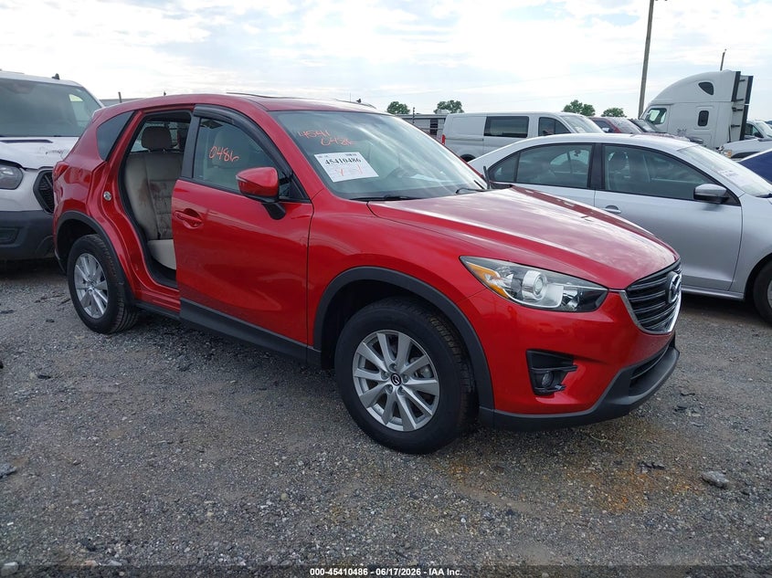 2016 Mazda Cx-5 VIN JM3KE4CY1G0803470 IAAI salvage auction — LEFT SIDE, Salvage (Pennsylvania), sold $3,050 on 2026-07-08 (photo 1)