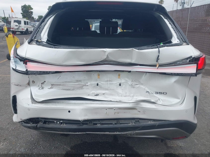 2023 Lexus Rx VIN JTJCHMAAXP2000281 IAAI salvage auction — REAR END, Salvage Title, sold $23,300 on 2026-07-13 (photo 6)