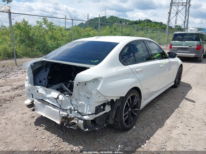 2023 BMW 3er VIN 3MW49FF06P8C88735 IAAI salvage auction — REAR END, Salvage Title, sold $20,500 on 2026-07-11 (photo 4)