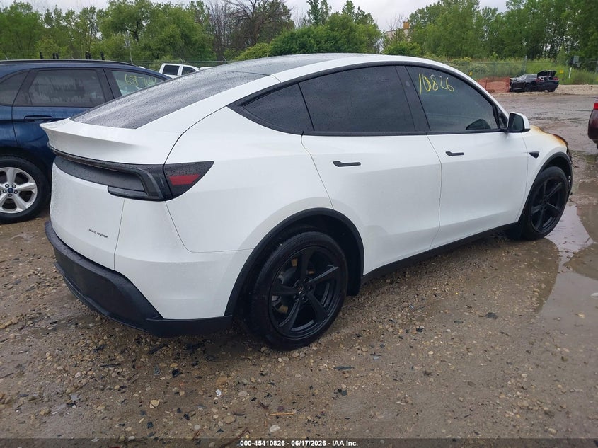 2026 Tesla Model y VIN 7SAYGDEE9TF408600 IAAI salvage auction — EXTERIOR BURN, Salvage (Wisconsin), sold $21,450 on 2026-07-23 (photo 4)