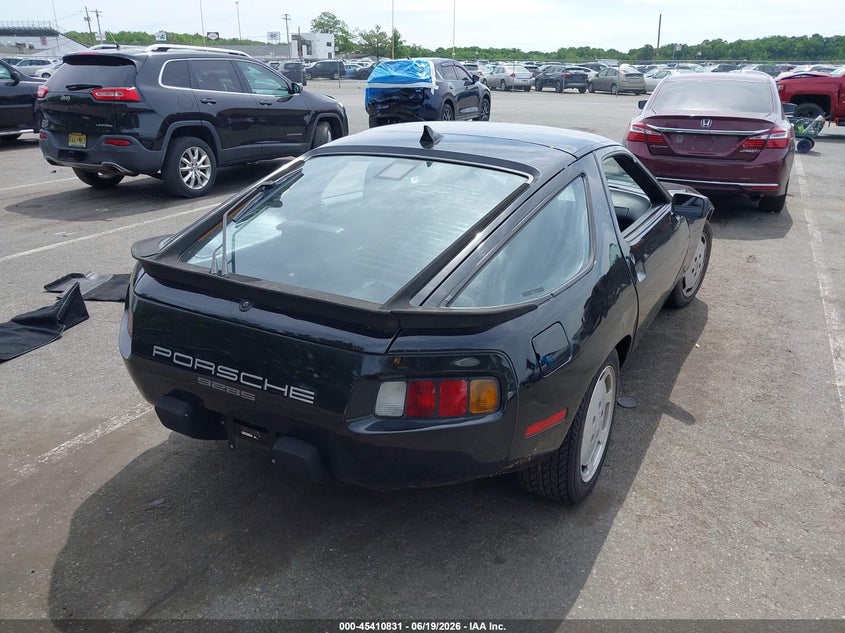 1986 Porsche 928 VIN WP0JB0929GS860559 IAAI salvage auction — LEFT SIDE, Salvage (Idaho), sold $4,000 on 2026-07-20 (photo 4)