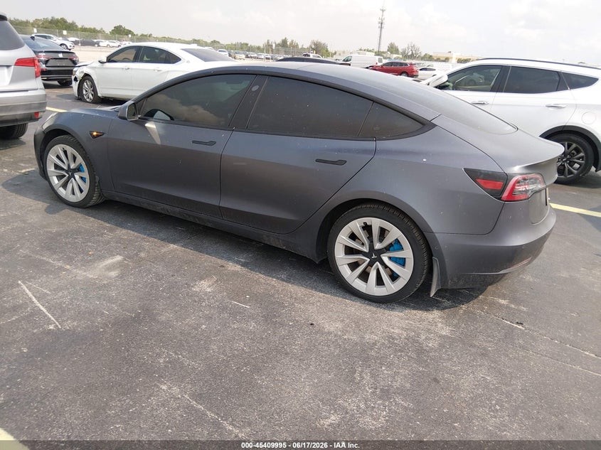 2022 Tesla Model 3 VIN 5YJ3E1EA4NF111049 IAAI salvage auction — RIGHT FRONT, Certificate Of Destruction (Florida), sold $5,250 on 2026-07-16 (photo 3)