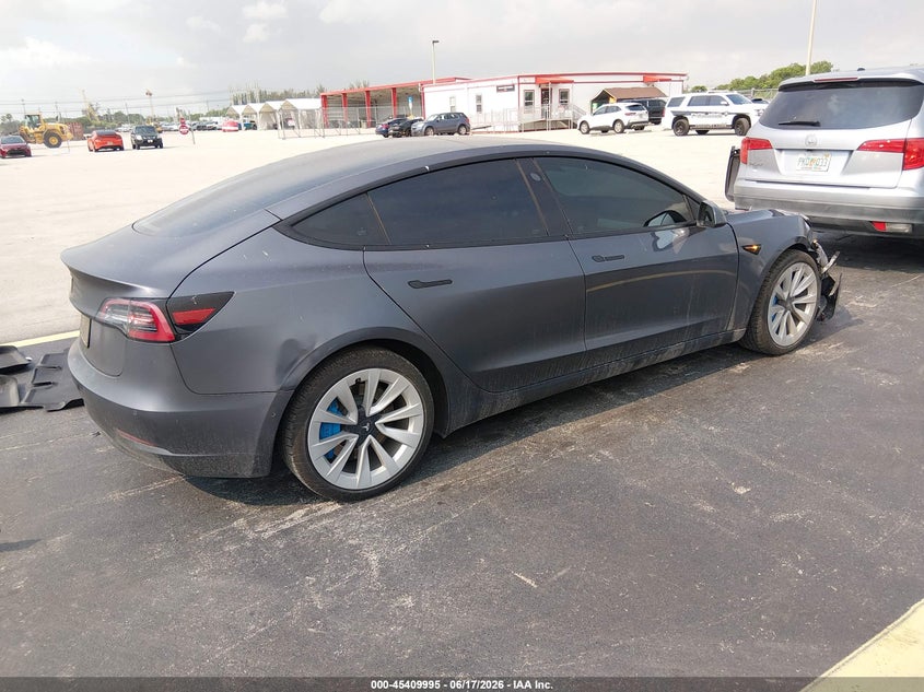 2022 Tesla Model 3 VIN 5YJ3E1EA4NF111049 IAAI salvage auction — RIGHT FRONT, Certificate Of Destruction (Florida), sold $5,250 on 2026-07-16 (photo 4)