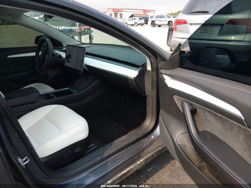 2022 Tesla Model 3 VIN 5YJ3E1EA4NF111049 IAAI salvage auction — RIGHT FRONT, Certificate Of Destruction (Florida), sold $5,250 on 2026-07-16 (photo 5)
