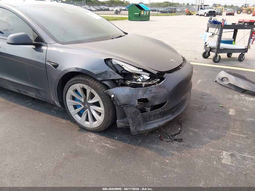2022 Tesla Model 3 VIN 5YJ3E1EA4NF111049 IAAI salvage auction — RIGHT FRONT, Certificate Of Destruction (Florida), sold $5,250 on 2026-07-16 (photo 6)
