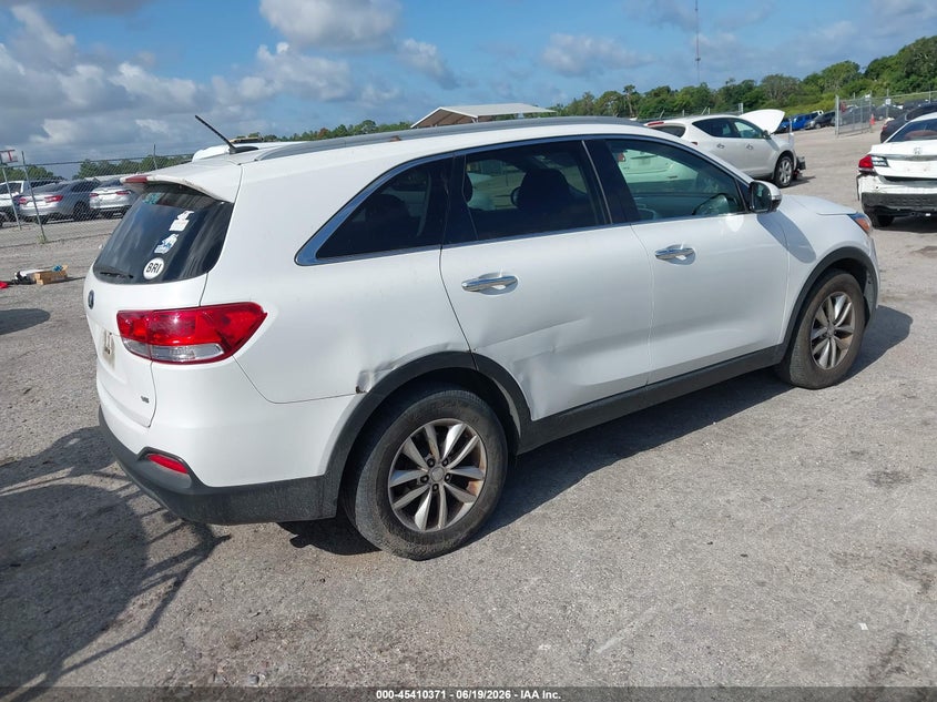 2016 Kia Sorento VIN 5XYPG4A51GG141451 IAAI salvage auction — NORMAL WEAR, Clear (Florida), sold $1,225 on 2026-07-16 (photo 4)
