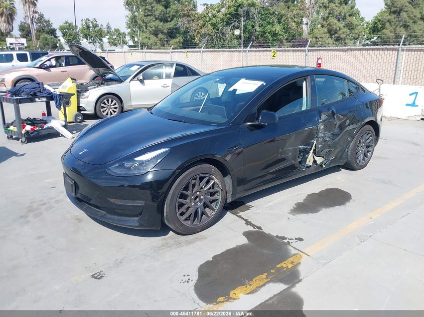2023 Tesla Model 3 VIN 5YJ3E1EA3PF662916 IAAI salvage auction — SIDE, Wait Title, sold $7,800 on 2026-08-30 (photo 2)