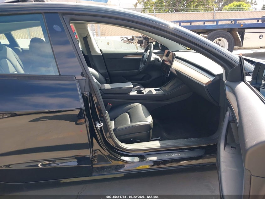 2023 Tesla Model 3 VIN 5YJ3E1EA3PF662916 IAAI salvage auction — SIDE, Wait Title, sold $7,800 on 2026-08-30 (photo 5)