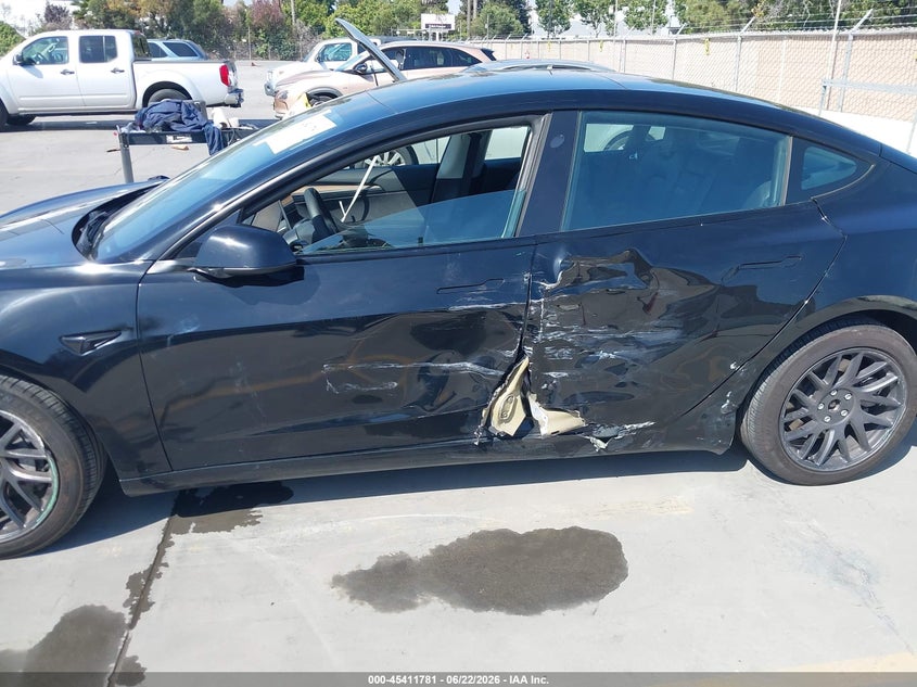 2023 Tesla Model 3 VIN 5YJ3E1EA3PF662916 IAAI salvage auction — SIDE, Wait Title, sold $7,800 on 2026-08-30 (photo 6)
