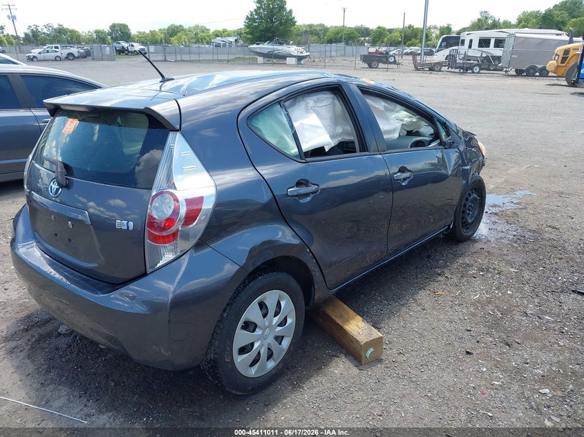 2012 Toyota Prius c VIN JTDKDTB3XC1008630 IAAI salvage auction — ROLLOVER, Salvage Title, sold $500 on 2026-07-21 (photo 4)