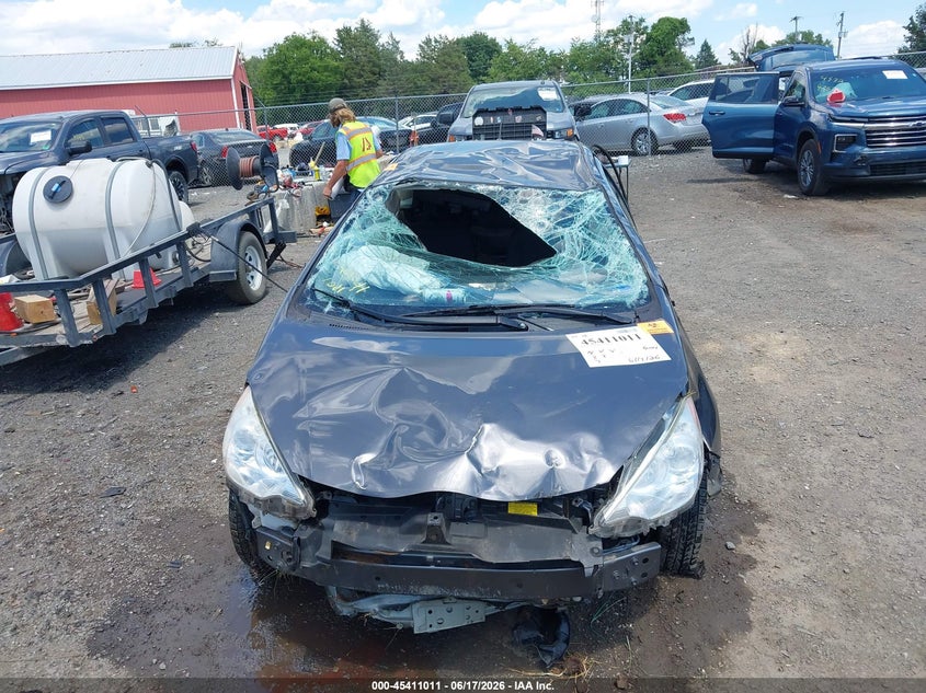 2012 Toyota Prius c VIN JTDKDTB3XC1008630 IAAI salvage auction — ROLLOVER, Salvage Title, sold $500 on 2026-07-21 (photo 6)