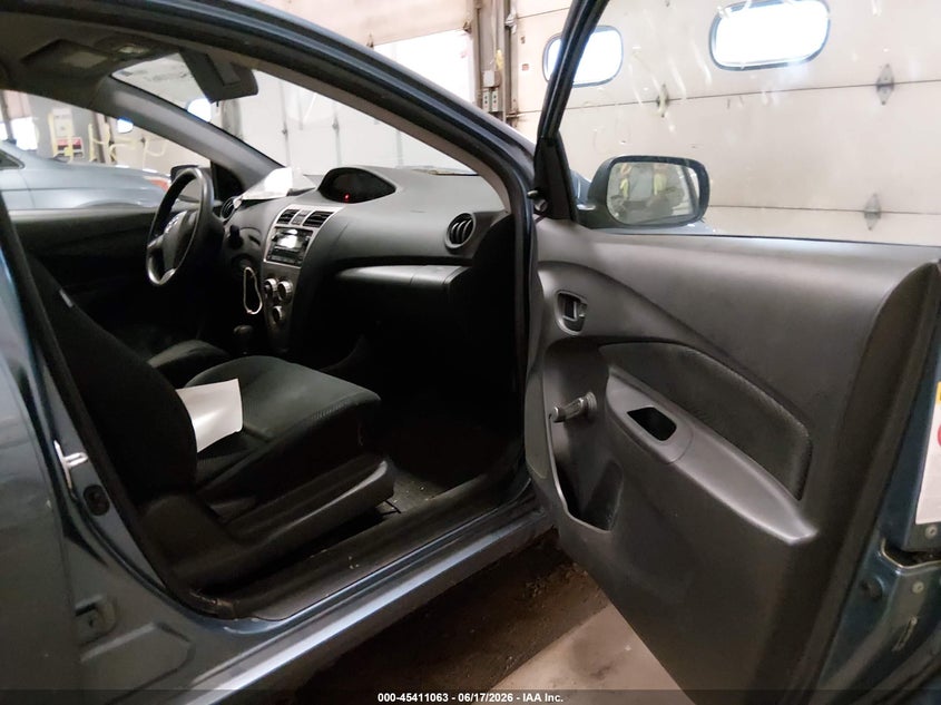 2009 Toyota Yaris VIN JTDBT903291307191 IAAI salvage auction — NORMAL WEAR, Prior Salvage (Minnesota), sold $650 on 2026-07-15 (photo 5)