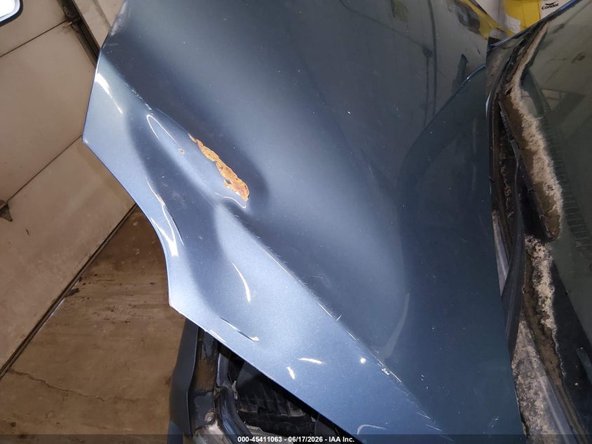 2009 Toyota Yaris VIN JTDBT903291307191 IAAI salvage auction — NORMAL WEAR, Prior Salvage (Minnesota), sold $650 on 2026-07-15 (photo 6)