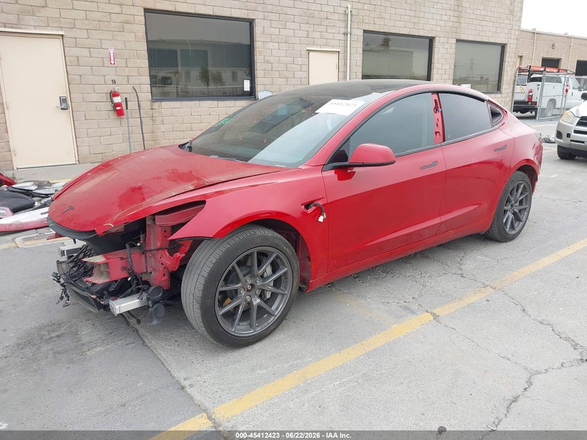 2022 Tesla Model 3 VIN 5YJ3E1EB9NF297390 IAAI salvage auction — FRONT & REAR, Salvage (California), sold $7,800 on 2026-07-13 (photo 2)
