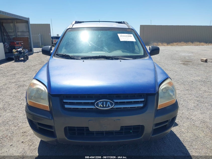 2005 Kia Sportage VIN KNDJF723157128362 IAAI salvage auction — NORMAL WEAR, Clear (California), sold $375 on 2026-07-09 (photo 6)