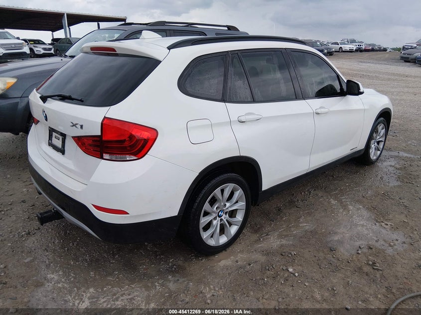 2014 BMW X1 VIN WBAVL1C59EVY22927 IAAI salvage auction — NORMAL WEAR, Clear (Tennessee), sold $125 on 2026-07-16 (photo 4)