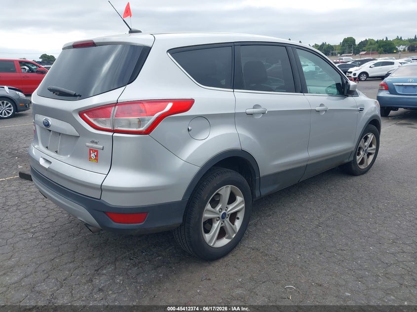 2016 Ford Escape VIN 1FMCU0GXXGUC35041 IAAI salvage auction — NORMAL WEAR, Clear-Dealer Only (Oregon), sold $1,150 on 2026-07-09 (photo 4)