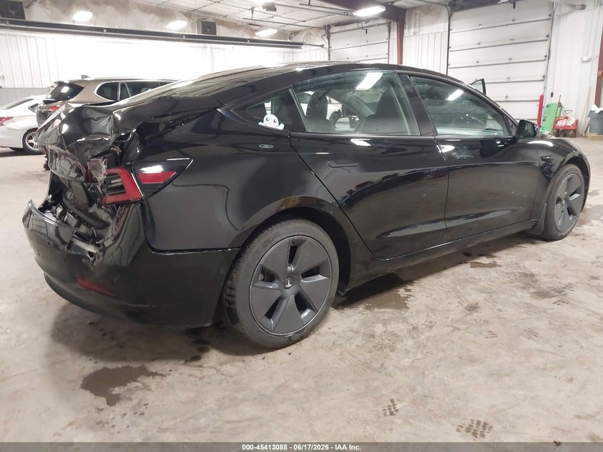 2021 Tesla Model 3 VIN 5YJ3E1EB0MF065579 IAAI salvage auction — REAR END, Salvage (Iowa), sold $7,750 on 2026-07-21 (photo 4)