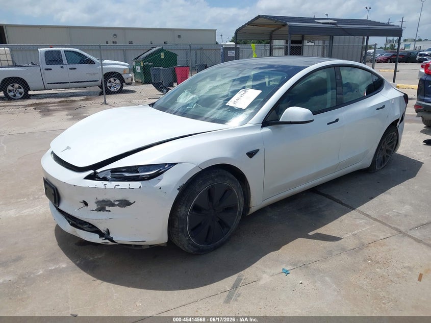 2025 Tesla Model 3 VIN 5YJ3E1EA9SF005613 IAAI salvage auction — SIDE, Salvage Title, sold $12,500 on 2026-09-03 (photo 2)