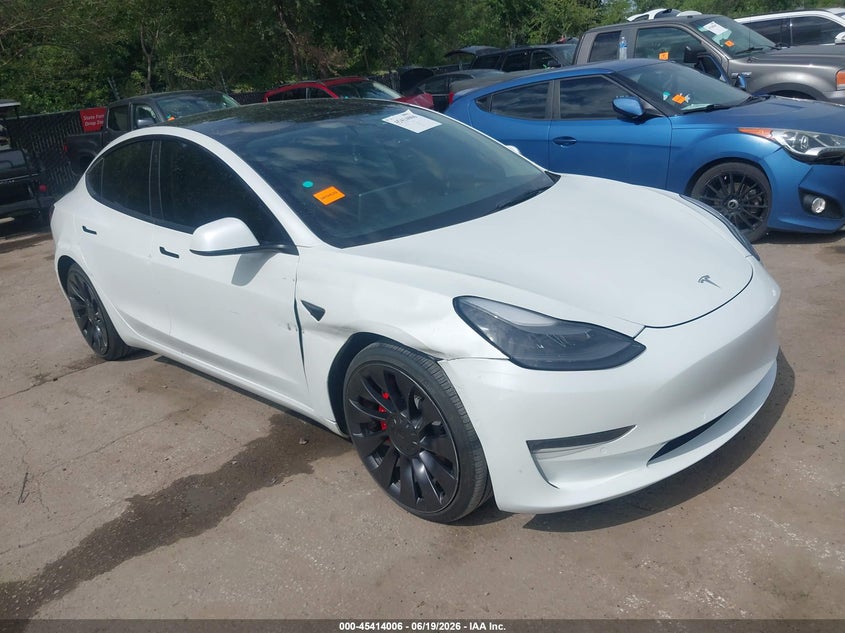 2022 Tesla Model 3 VIN 5YJ3E1EC1NF273836 — IAAI salvage auction photo