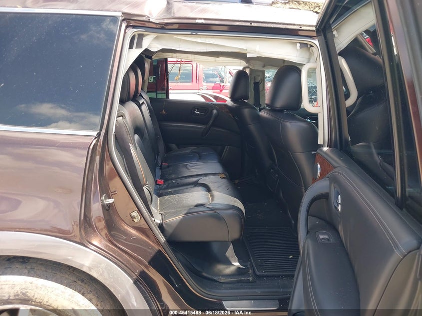 2017 Nissan Armada VIN JN8AY2ND2H9004907 IAAI salvage auction — ROLLOVER, Salvage Title, sold $1,675 on 2026-07-24 (photo 8)