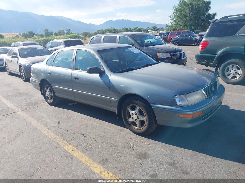1997 Toyota Avalon VIN 4T1BF12B9VU143942 IAAI salvage auction — FRONT & REAR, Clear (Idaho), sold $275 on 2026-07-09 (photo 1)