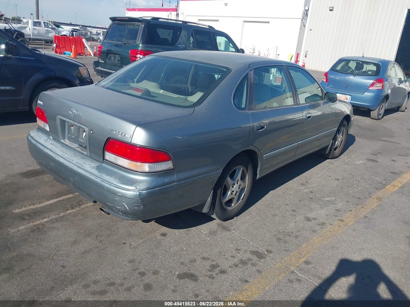 1997 Toyota Avalon VIN 4T1BF12B9VU143942 IAAI salvage auction — FRONT & REAR, Clear (Idaho), sold $275 on 2026-07-09 (photo 4)
