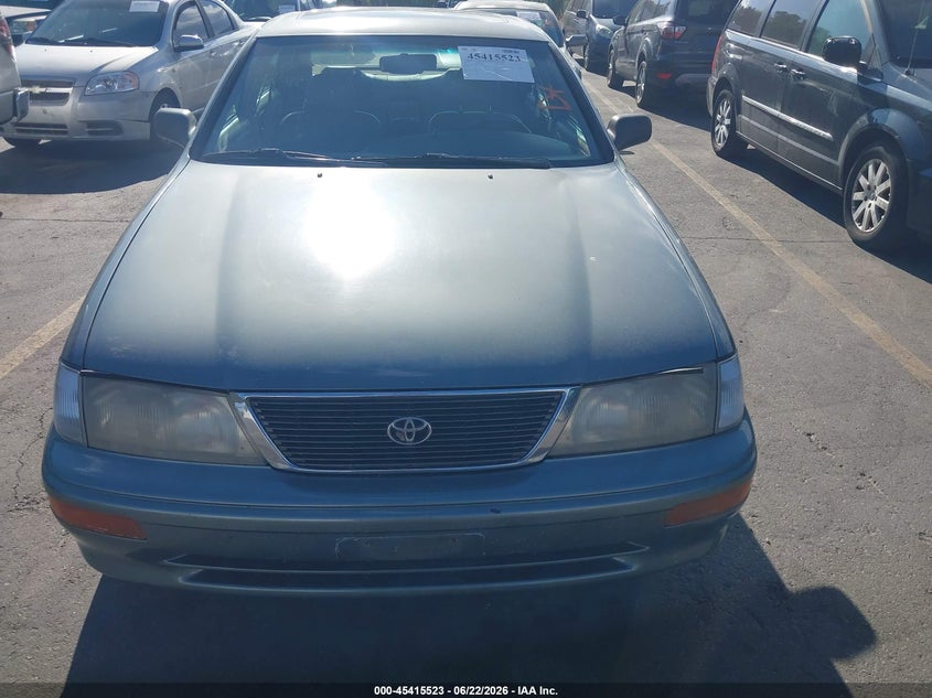 1997 Toyota Avalon VIN 4T1BF12B9VU143942 IAAI salvage auction — FRONT & REAR, Clear (Idaho), sold $275 on 2026-07-09 (photo 6)