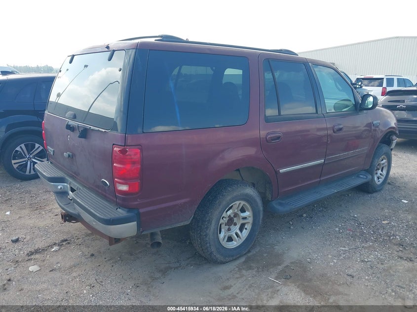 2000 Ford Expedition VIN 1FMPU16L5YLA98569 IAAI salvage auction — NORMAL WEAR, Original (Texas), sold $225 on 2026-07-09 (photo 4)