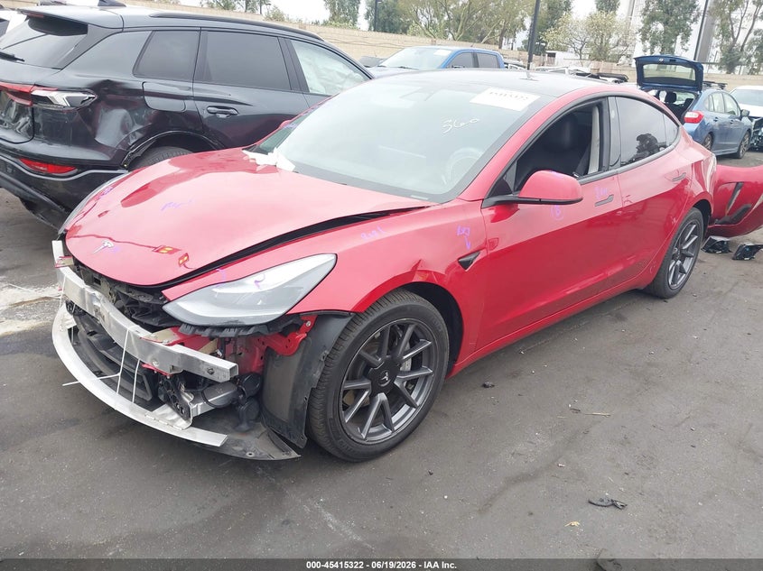 2021 Tesla Model 3 VIN 5YJ3E1EA1MF095472 IAAI salvage auction — FRONT & REAR, Salvage Title, sold $4,100 on 2026-07-17 (photo 2)