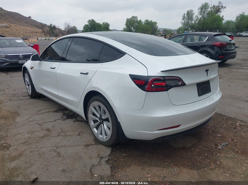 2021 Tesla Model 3 VIN 5YJ3E1EA7MF099042 IAAI salvage auction — SIDE, Salvage (California), sold $6,000 on 2026-07-09 (photo 3)