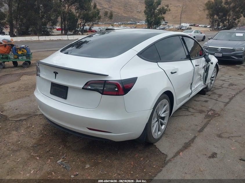 2021 Tesla Model 3 VIN 5YJ3E1EA7MF099042 IAAI salvage auction — SIDE, Salvage (California), sold $6,000 on 2026-07-09 (photo 4)