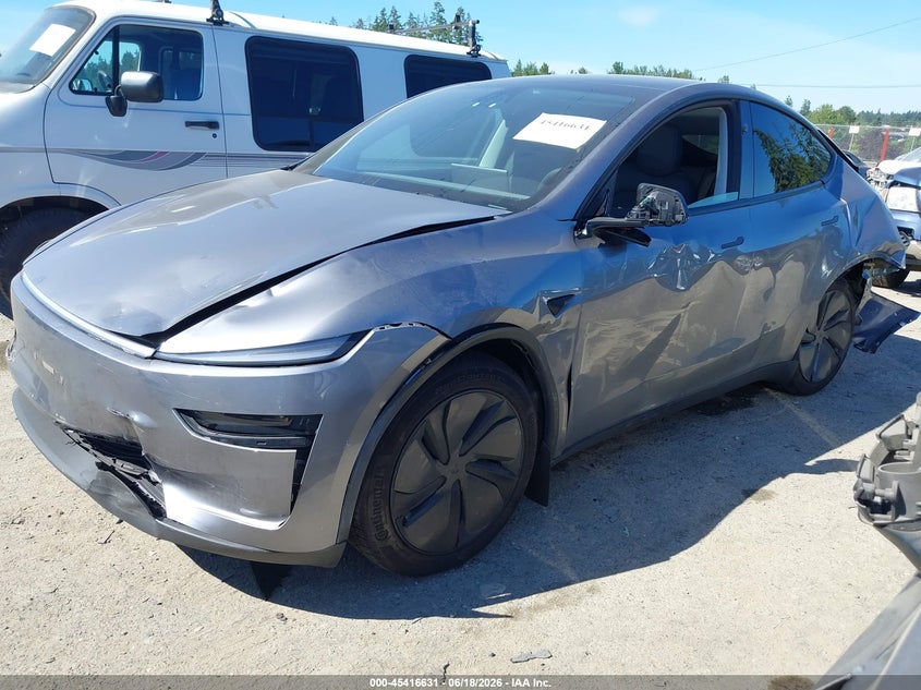 2026 Tesla Model y VIN 7SAYGDEE0TF363711 IAAI salvage auction — FRONT & REAR, Salvage Title, sold $10,025 on 2026-07-30 (photo 2)